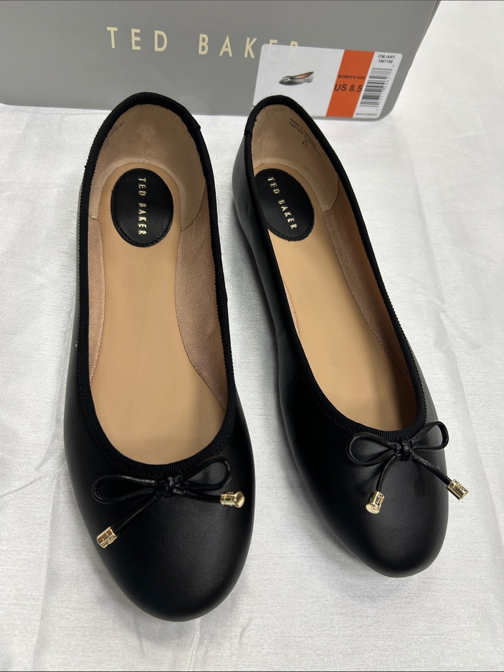 Ted Baker Black Leather Ballet Flats with Bow and Gold Accents